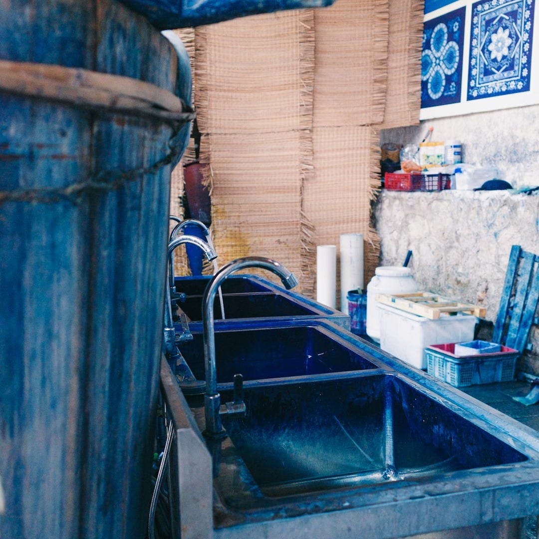 Dye vats and sinks in a workshop